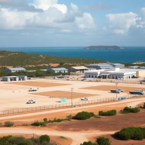 Panoramic view of the Guantanamo Bay detention facility with construction underway.